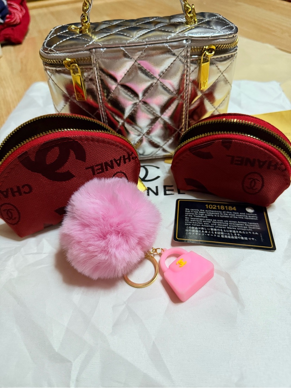 Pink Pom Pom Keychain with Silver Cosmetic Bag Set